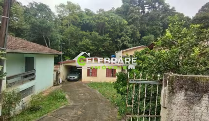 TERRENO NO SANTA CÂNDIDA! COM 03 CASAS,PROX. SUPERMERCADO BONI