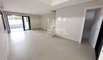 SOBRADO GEMINADO COM 3 SUÍTES E 4 VAGAS DE GARAGEM COM PASSAGEM LATERAL