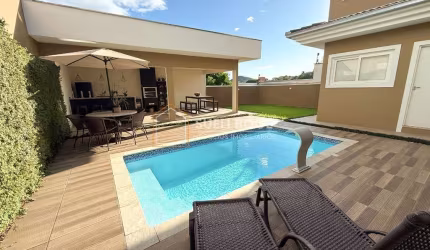 CASA EM CONDOMÍNIO COM 4 DORMITÓRIOS, PISCINA E ÁREA DE FESTAS