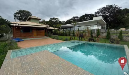Casa com 3 dormitórios à venda, 200 m² por R$ 1.200.000,00 - Condomínio Serra dos Bandeirantes - Mário Campos/MG