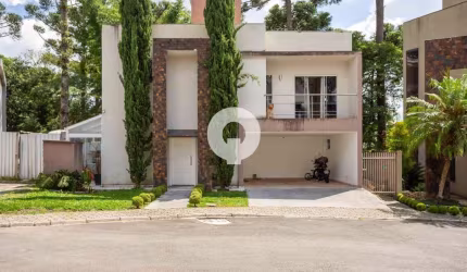 Casa 225m² Bacacheri - 3 suítes e terreno grande em condomínio fechado