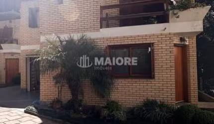 Casa em condomínio fechado com 3 quartos à venda no Petrópolis, Caxias do Sul  por R$ 620.000