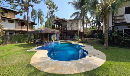 Casa dos Sonhos em Camburizinho: 5 suítes, seu conforto a Poucos Passos da Praia