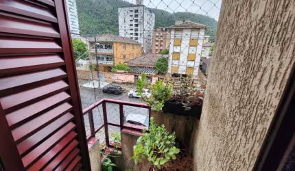 Apartamento com 2 dormitórios mais dependência e garagem no bairro do Marapé fechada , valor R$450.000,00