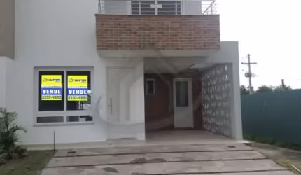 Imóvel possui 3 dormitórios, sendo 1 suíte, lavabo, living 2 ambientes. Área de serviço, amplo pátio nos fundos, garagem para 2 carros. Acabamento Impecável com porcelanato, sanca em gesso. Escada em 