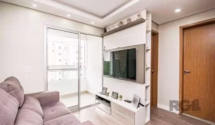 Apartamento com 2 quartos, sala, cozinha, sacada com churrasqueira e 1 vaga.