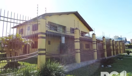 Casa 4 dormitórios à venda Parque Santa Fé Porto Alegre/RS