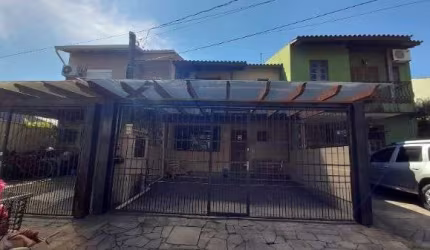 Casa em Porto Alegre, no bairro Hípica, com 3 dormitório(s), à venda.