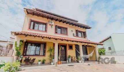 Casa com 234m², 3 dormitórios, 3 vagas no bairro Partenon