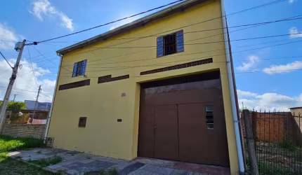 Casa no bairro Restinga - 3 dormitórios