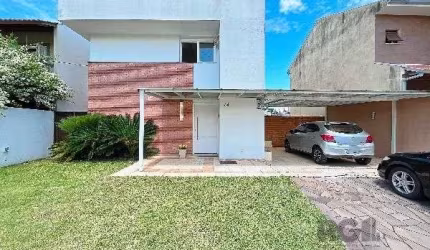 Casa em Porto Alegre, no bairro Hípica, com 3 dormitório(s), e 3 banheiros, à ve