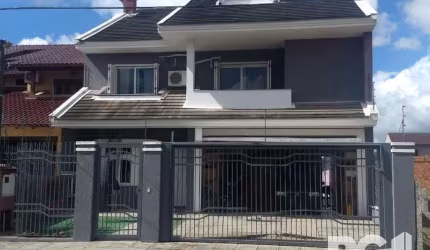 Casa 4 dormitórios à venda Parque Santa Fé Porto Alegre/RS