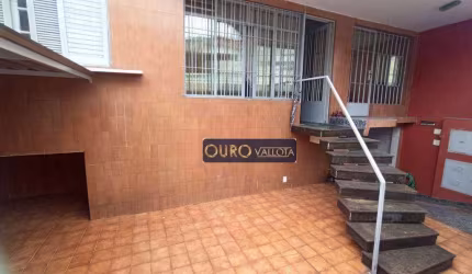 Terreno com 2 casas para venda