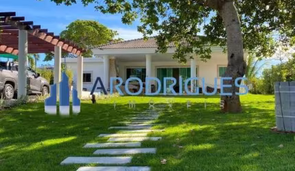 Luxuosa casa em condomínio à venda em Busca Vida, Camaçari-BA: 5 quartos, 5 suítes, 1 sala, 5 banheiros, 5 vagas, 950m².