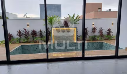 Casa em condomínio fechado com 4 quartos à venda no Jardins Gênova, Uberlândia  por R$ 2.800.000