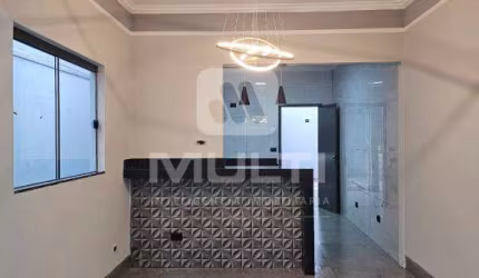 Casa com 3 quartos à venda no Jardim Brasília, Uberlândia  por R$ 650.000