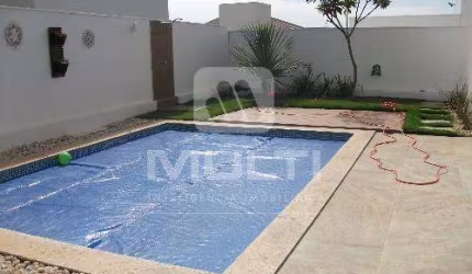 Casa em condomínio fechado com 3 quartos à venda no Jardins Barcelona, Uberlândia  por R$ 2.100.000