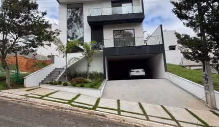 MARAVILHOSO sobrado no Condomínio MOSAICO DA SERRA 324 m² com 4 suítes espaço gourmet e piscina