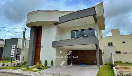 Casa duplex com 5 dormitórios no Ecoville 1