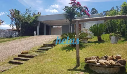 Casa térrea com 216 m², 3 dormitórios, à venda por R$ 1.300.000 - Condomínio Estância dos Lagos - Atibaia/SP