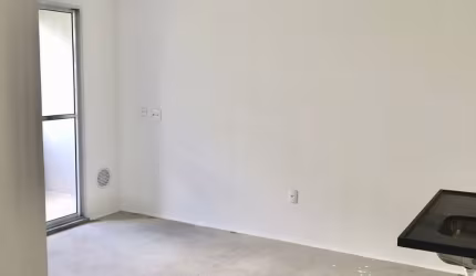 Apartamento de 2 dormitórios com varanda e vaga