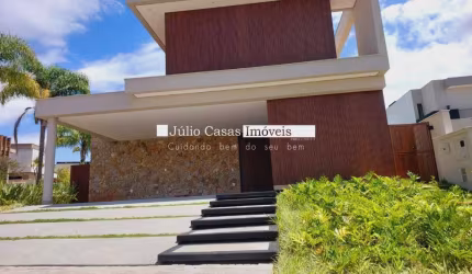 Casa a venda em condomínio com 4 suítes