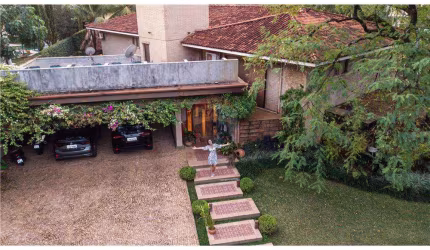 Casa para venda em Jardim América de 585.00m² com 4 Quartos, 4 Suites e 6 Garagens