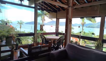 Casa para venda em Praia Da Enseada de 291.00m² com 4 Quartos, 2 Suites e 6 Garagens