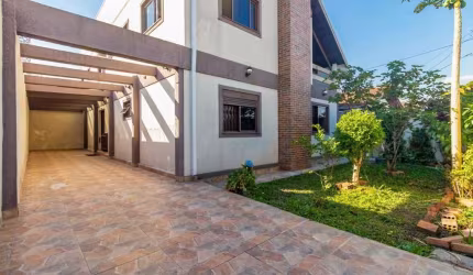 Casa com 5 dormitórios à venda, 220 m² por R$ 850.000,00 - Uberaba - Curitiba/PR