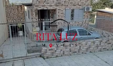Casa com 3 quartos à venda na Rua Martim Minaberry, 395, Partenon, Porto Alegre por R$ 420.000