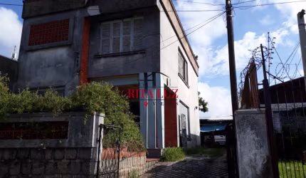 Casa com 3 quartos à venda na Rua Caldre e Fião, 524, Santo Antônio, Porto Alegre por R$ 580.000