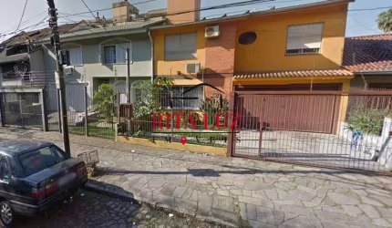 Casa em condomínio fechado com 3 quartos à venda na Rua Professor Guerreiro Lima, 1026, Partenon, Porto Alegre por R$ 850.000