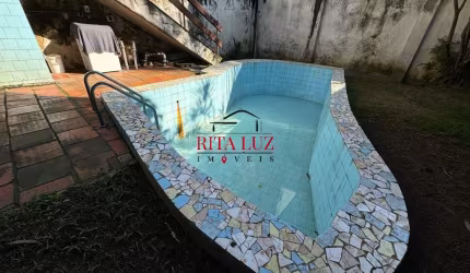 Casa com 4 quartos à venda na Rua Silva Só, 147, Santa Cecília, Porto Alegre por R$ 920.000