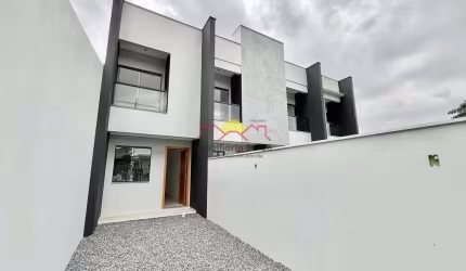 Sobrado Geminado com 02 Vagas de Garagem