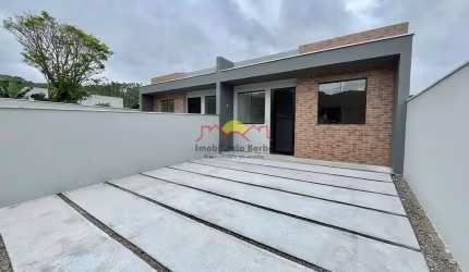Casa Geminada com 02 Vagas de Garagem