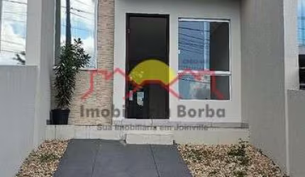 Sobrado Geminado com 02 Quartos e Churrasqueira