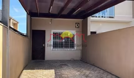 Sobrado Geminado com 02 Vagas de Garagem