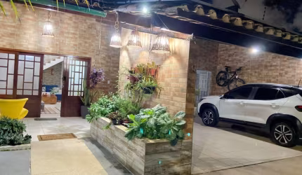 Casa com 3 quartos sendo 2 suítes,  localizada no Feito
