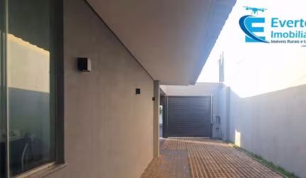 Espaço empresarial, no Bairro Custódio Pereira, em terreno de 300m2., contendo uma construção moderna em 2 pavimentos, com área construída de 400m2.;