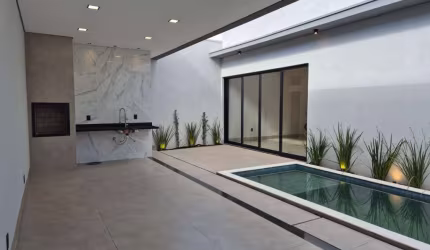 Casa de alto padrão, com 3 suítes, piscina, varanda gourmet e 2 vagas cobertas, no Terras Alpha.