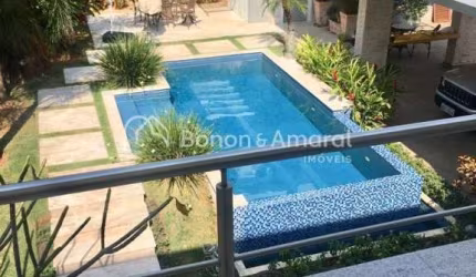 Casa de condomínio com 520 m² e 4 suítes