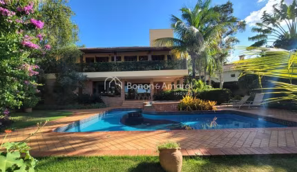 Casa de condomínio com 4 suítes à venda, 360 m²