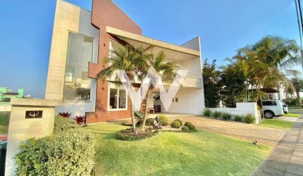Casa em condomínio fechado com 5 quartos à venda na Zona Nova, Capão da Canoa  por R$ 2.300.000