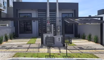 Casa com 3 quartos à venda na Rua Walter Pacheco, 40, Oriço, Gravataí por R$ 490.000