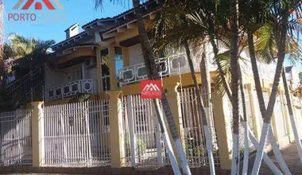 Casa com 4 dormitórios à venda, 372 m² por R$ 1.800.000,00 - Jardim Planalto - Porto Alegre/RS