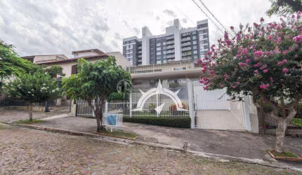 Casa com 3 dormitórios à venda, 290 m² por R$ 1.300.000,00 - Vila Ipiranga - Porto Alegre/RS
