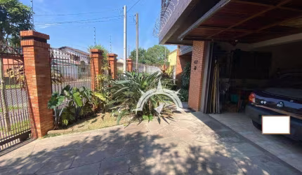 Casa com 3 dormitórios à venda por R$ 980.000 - Jardim Floresta - Porto Alegre/RS