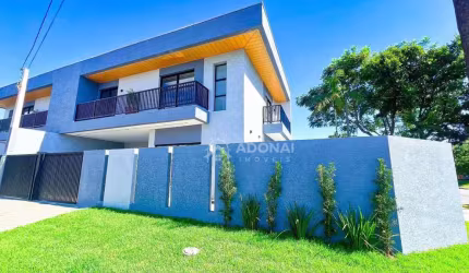 Sobrado com alto padrão de acabamento, 3 dormitórios à venda, 147 m² por R$ 960.000 - Cohapar - Guaratuba/PR