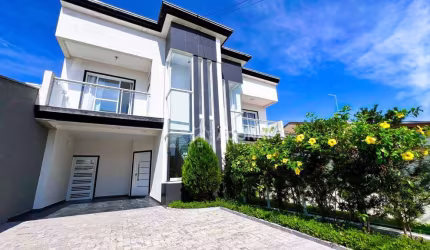 Sobrado com 3 dormitórios à venda, 135 m² por R$ 950.000,00 - Brejatuba - Guaratuba/PR