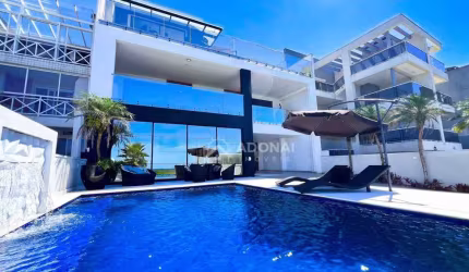 Mansão a beira-mar, com 7 dormitórios à venda, 485 m² por R$ 5.200.000 - Brejatuba - Guaratuba/PR